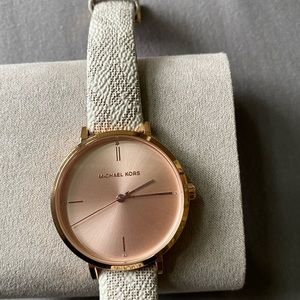 Michael Kors Women’s Jayne Three- Handed Rose Gold tone Alloy Watch MK7128